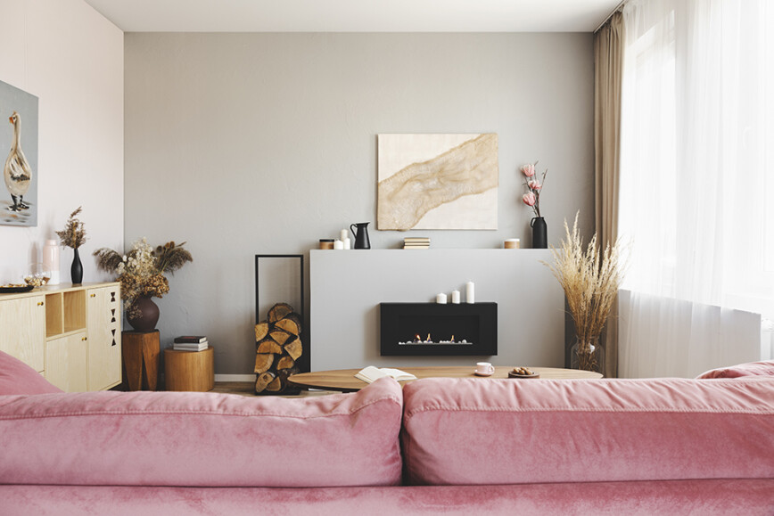 Pink sofa and electric fire 